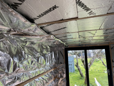 Super Quilt SF19 Insulation being fitted in extra high energy efficient Eco Garden Rooms available from Garden Haven Rooms, Dublin & Kildare, Ireland