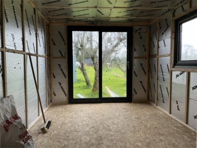 Standard wall insulation being fitted in energy efficient Eco Garden Rooms available from Garden Haven Rooms, Dublin & Kildare, Ireland